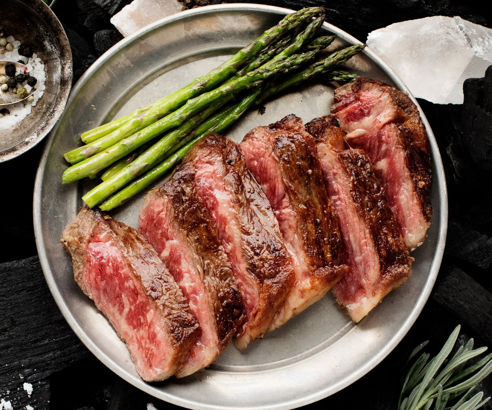 Wagyu Steak cooked and sliced on a plate