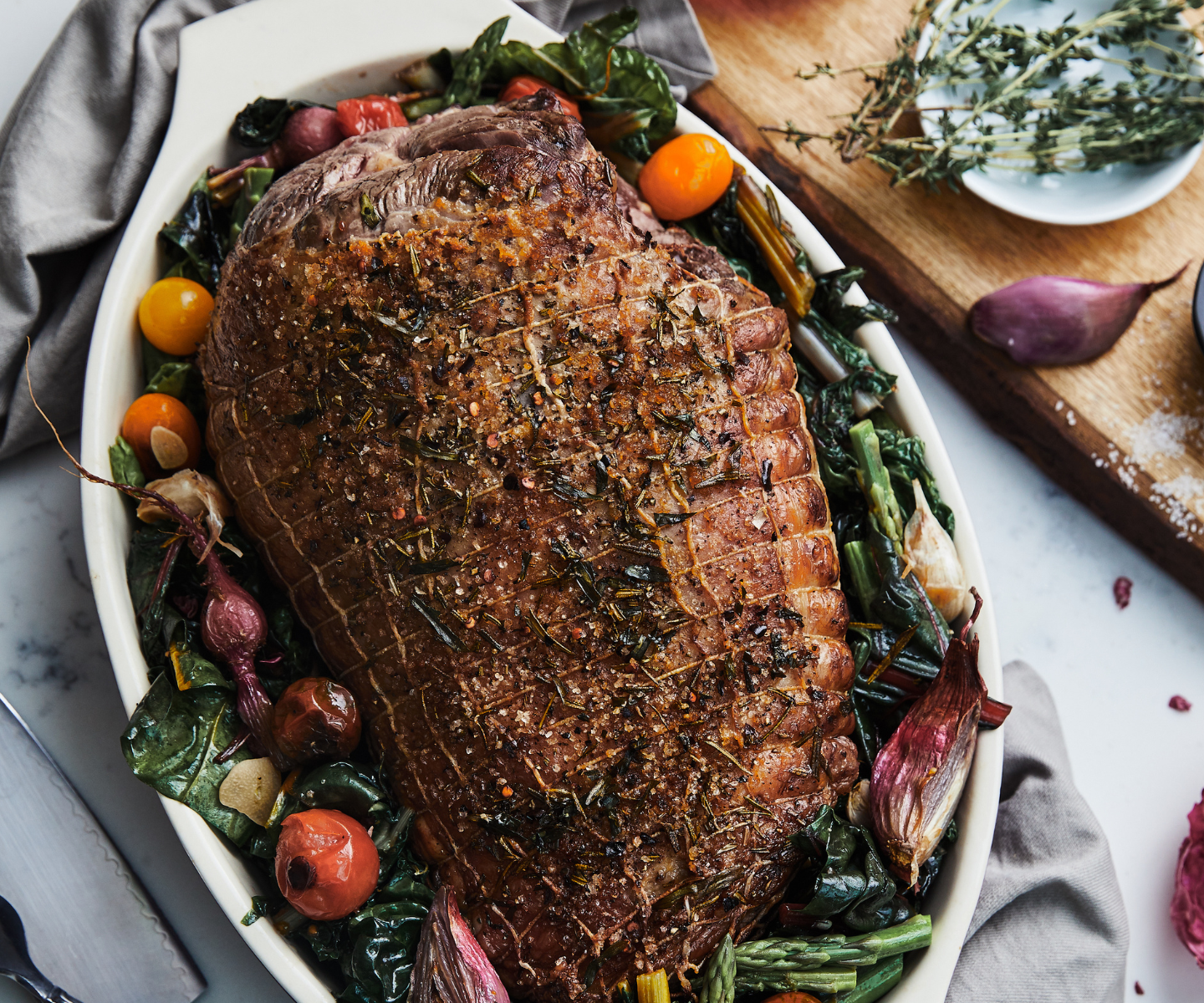 Rack of Lamb in Dish w/ veggies
