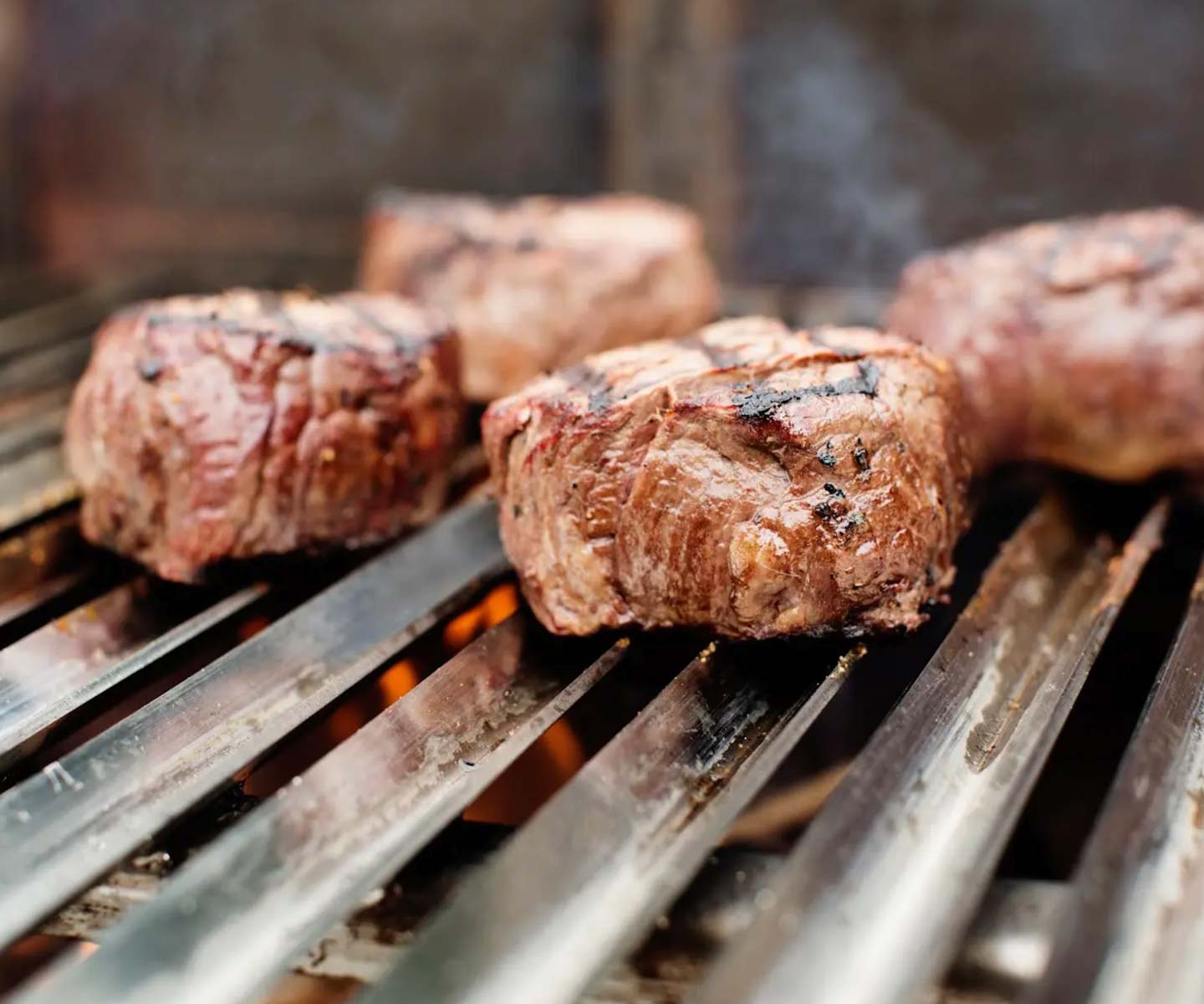 grass fed filet mignon on a grill