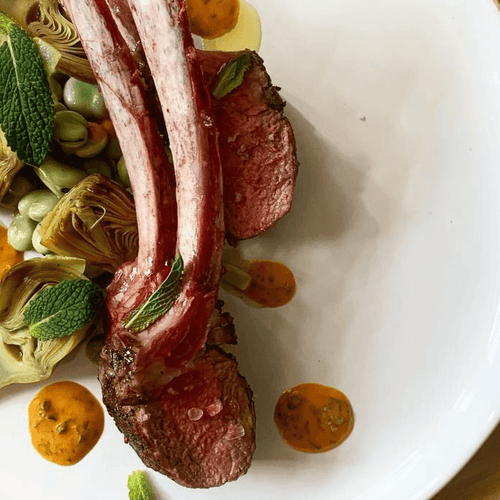 Chef Silvia Barban's Seared Rack of Lamb with Spring Vegetable, Mint & Harissa Sauce