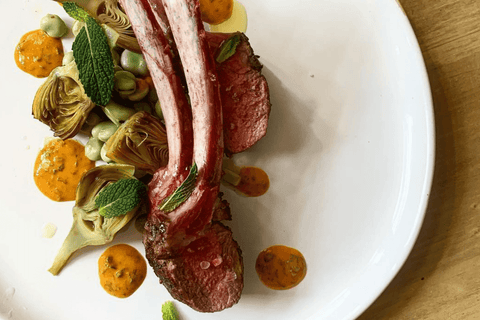 Chef Silvia Barban's Seared Rack of Lamb with Spring Vegetable, Mint & Harissa Sauce