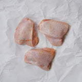 Raw Chicken Thighs on Butcher Paper
