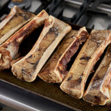 Bones being cooked on a grill