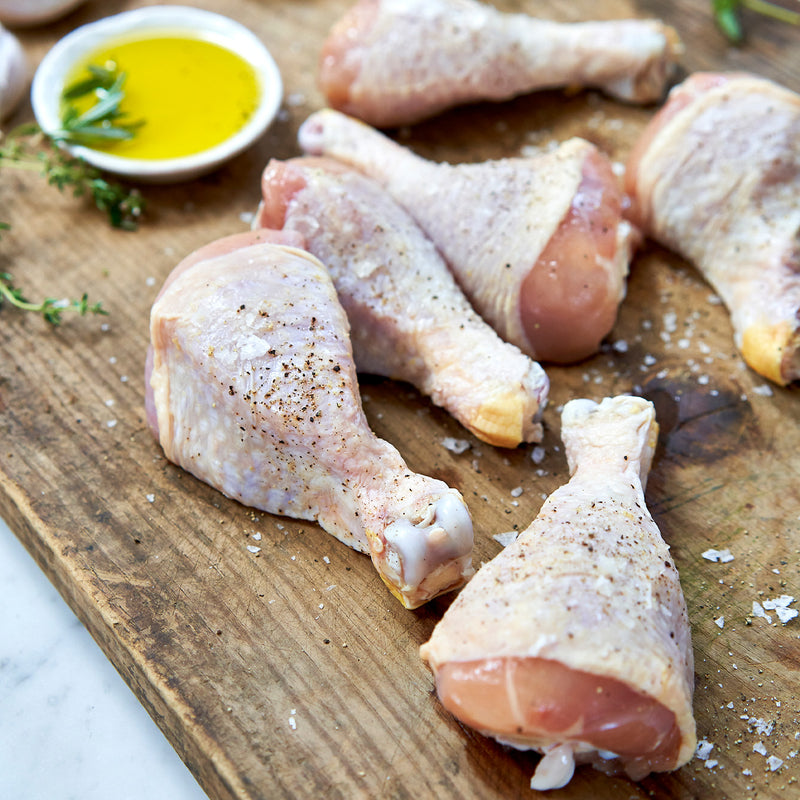 Raw chicken drumsticks with salt & pepper