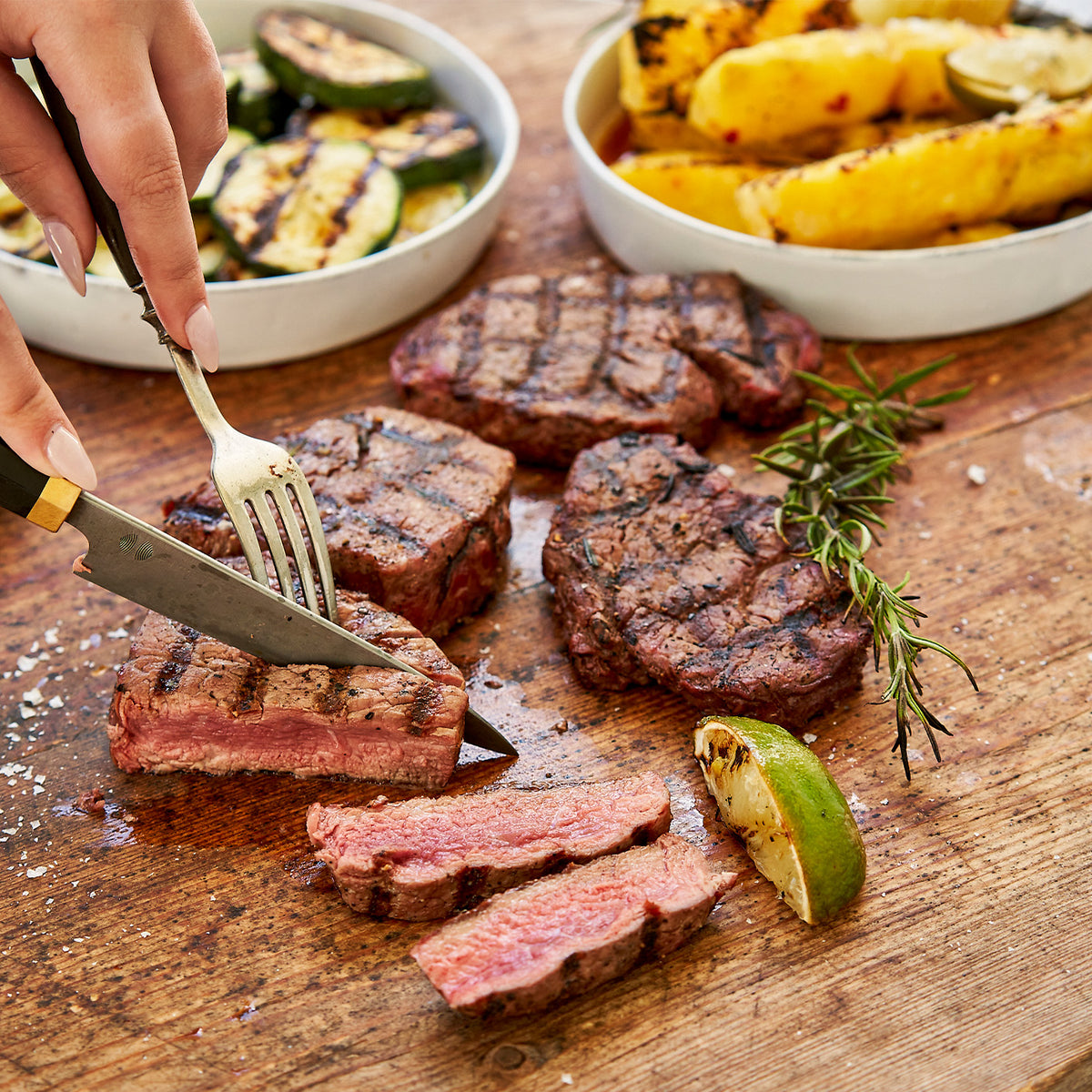 Grilled Tenderloin Steak being cut