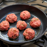 Lamb meatballs on stove