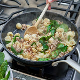 Pasta with ground veal being cooked in a skillet