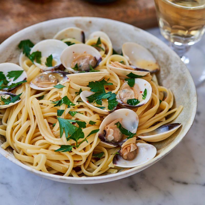 Hardshell clams in fettucine pasta 