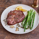 Lamb steak plated with veggies