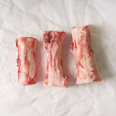 Long Beef Marrow Bones on Butcher Paper