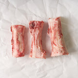 Long Beef Marrow Bones on Butcher Paper