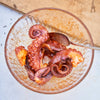 Octopus seasoned in a bowl 