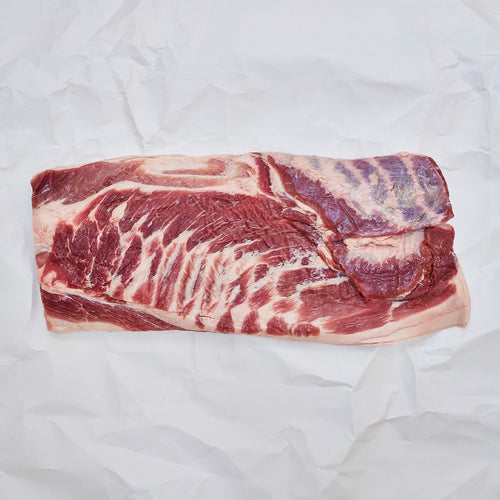 Boneless, Skin-On Whole Pork Belly on butcher paper
