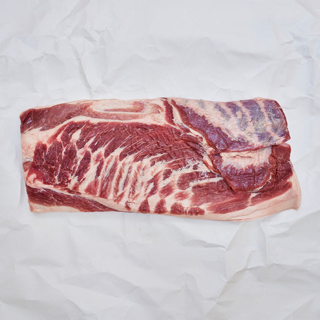 Boneless, Skin-On Whole Pork Belly on butcher paper