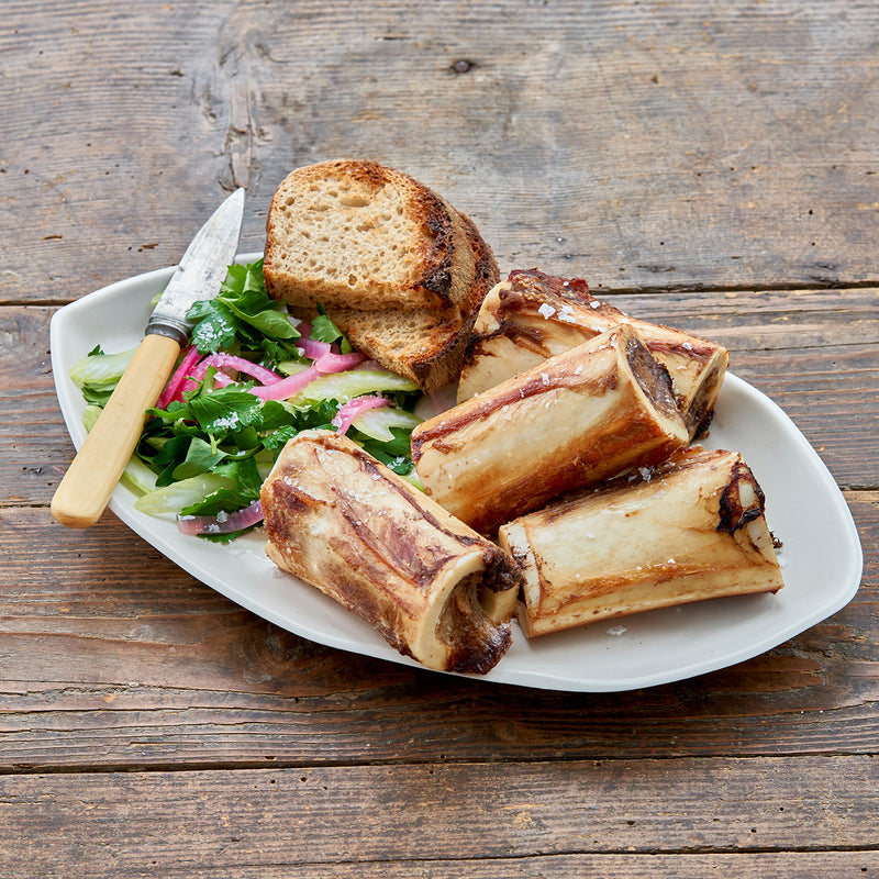 Center Cut Marrow Bones served with bread and salad - Market House