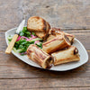 Center Cut Marrow Bones served with bread and salad - Market House